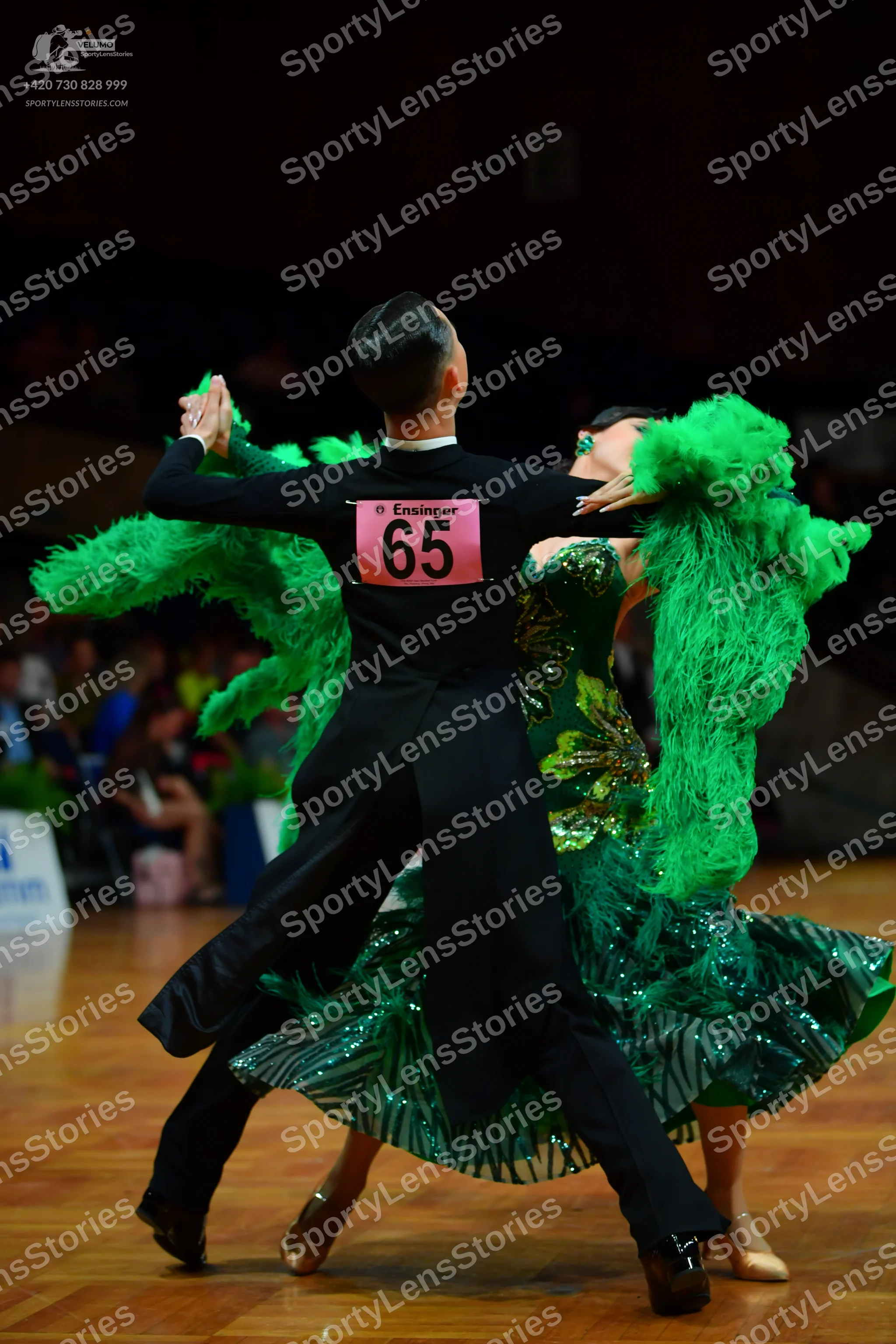 Dancesport competitor: Male dancer: black long-sleeved shirt and trousers