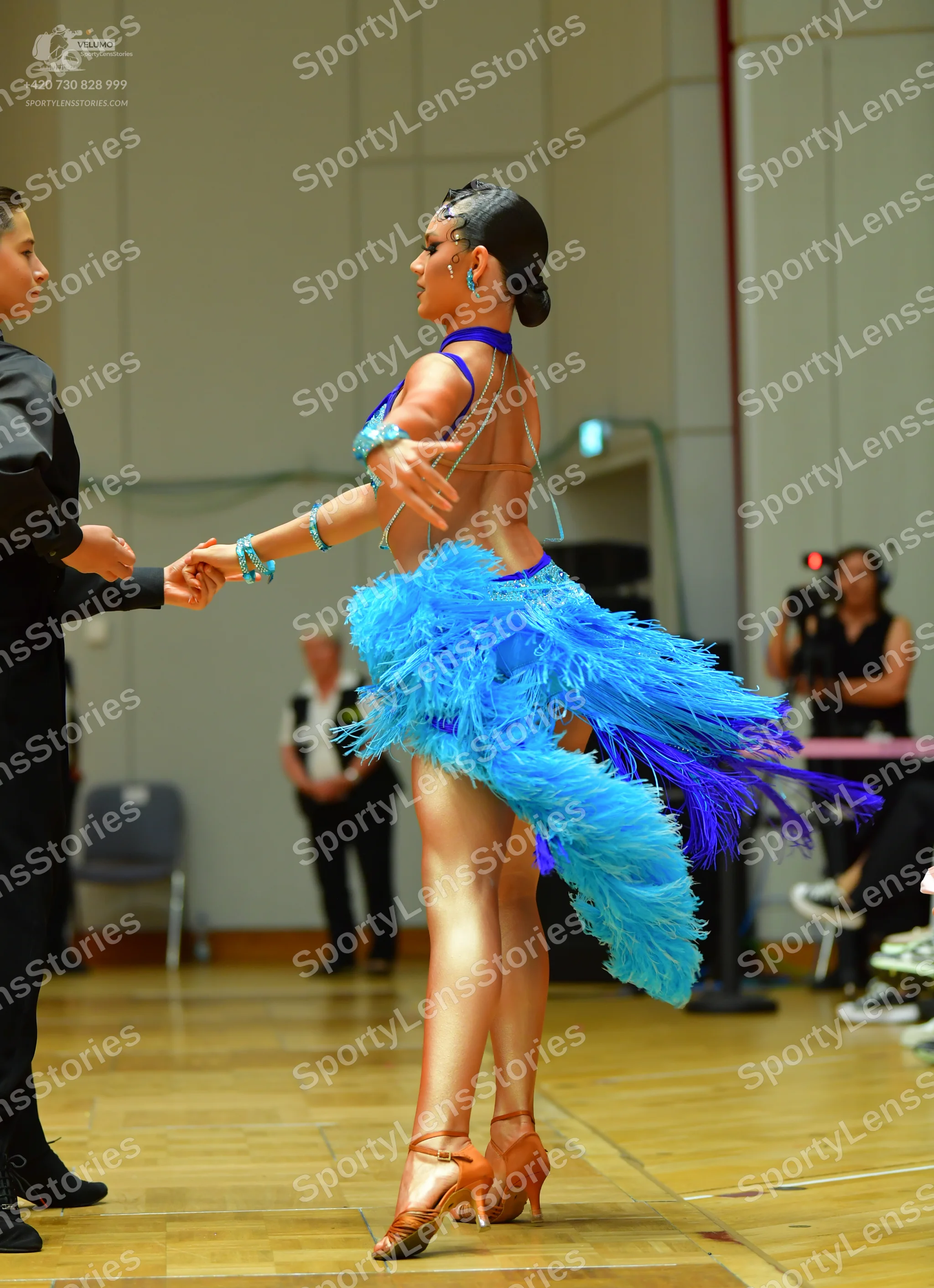 Dancesport competitor: Male dancer: black long-sleeved shirt and black trousers