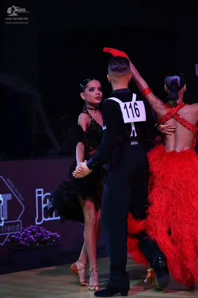 Dancesport competitor: Male dancer: black suit