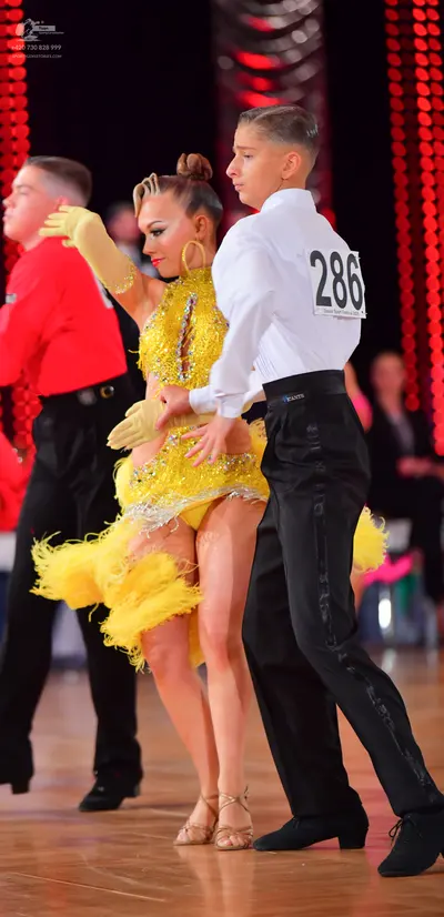 Dancesport competitor #286: Male dancer: white long-sleeved shirt and black trousers