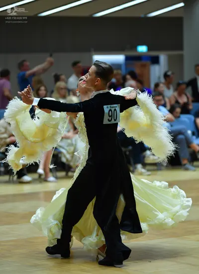 Dancesport competitor #90: Male dancer: black long-sleeved top and black trousers