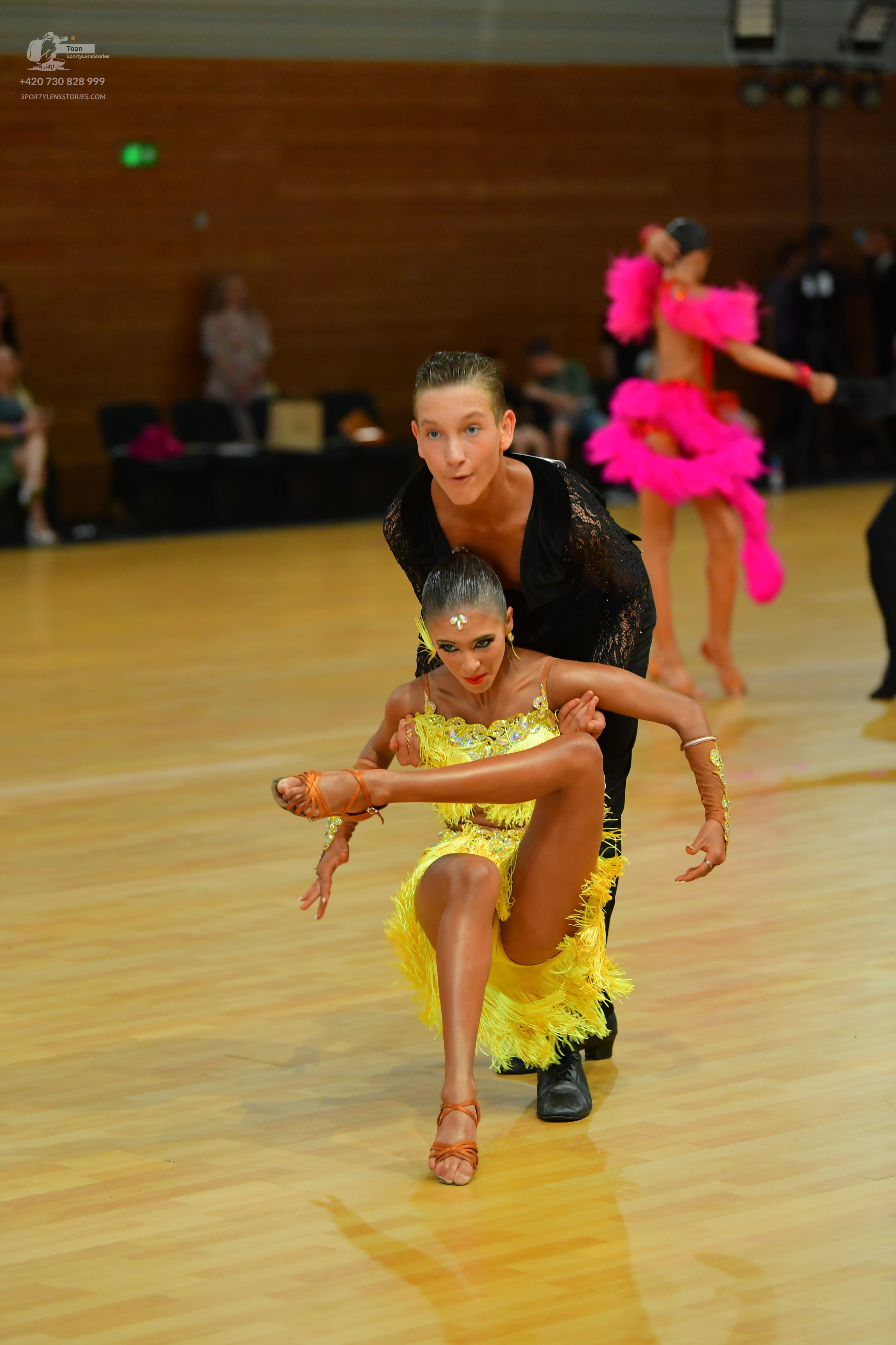 Dancesport competitor: ** Black tailsuit