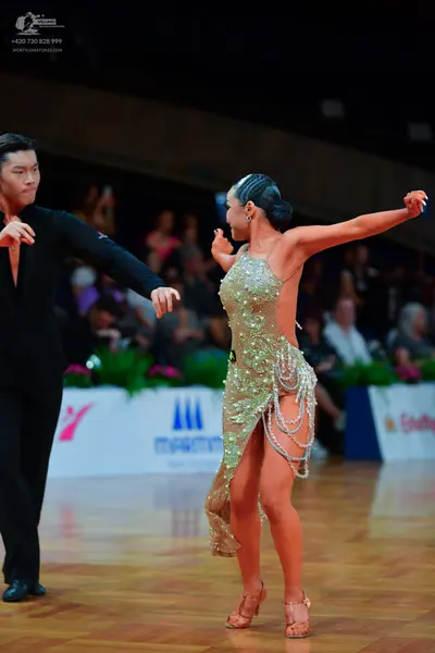 Dancesport competitor: Male dancer: black long-sleeved dance shirt and trousers