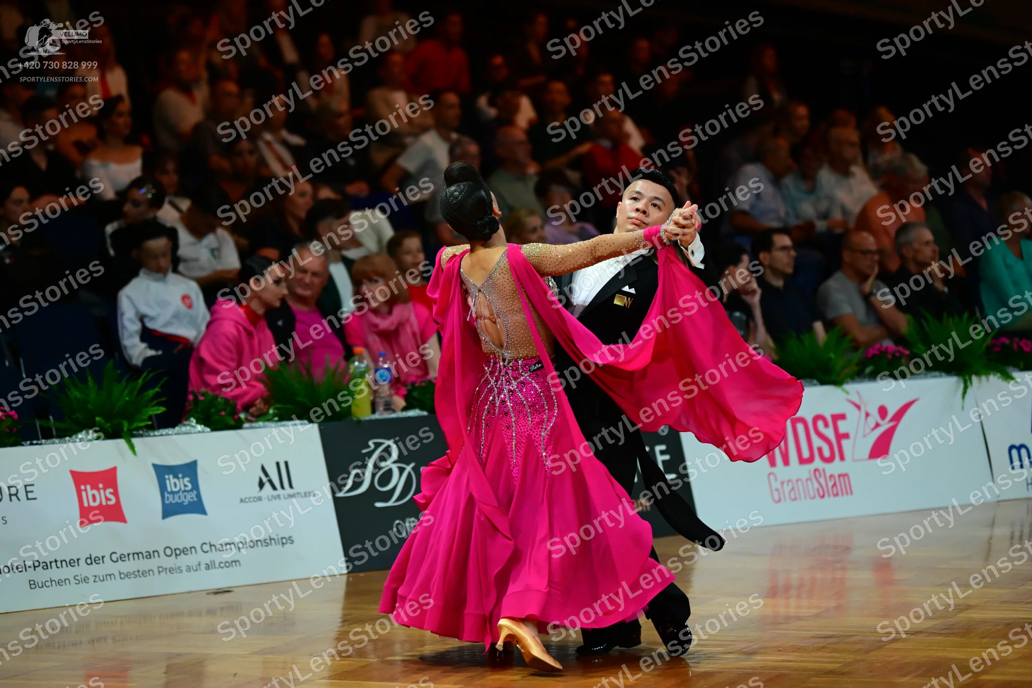 Dancesport competitor: Male dancer: black formal suit with a white shirt