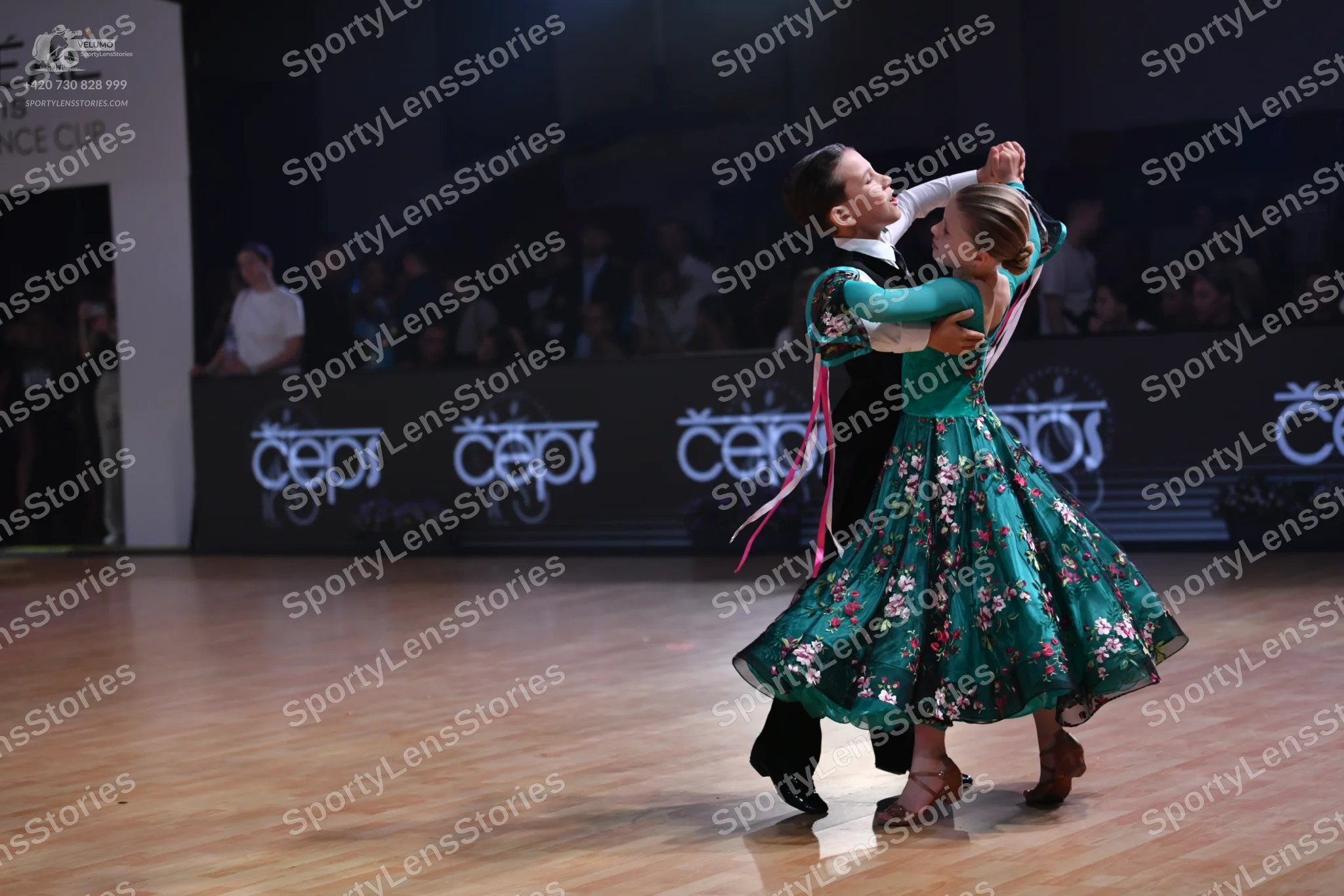 Dancesport competitor: Male dancer: black suit with a white shirt