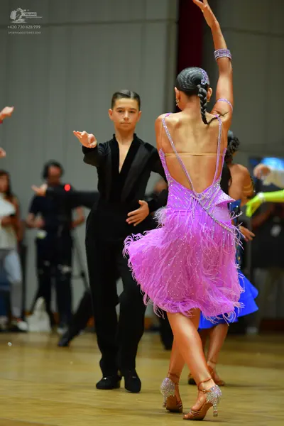 Dancesport competitor: Male dancer: black dance suit
