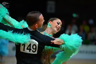 Dancesport competitor #149: Male dancer: black long-sleeved dance top