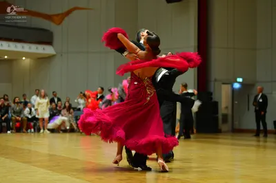 Dancesport competitor: Male dancer: black suit