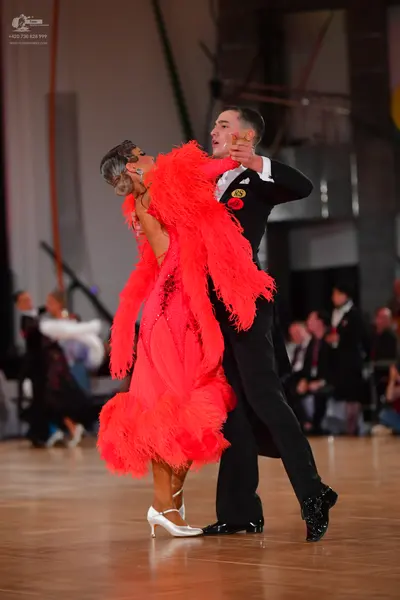 Dancesport competitor #73: Male dancer: black suit