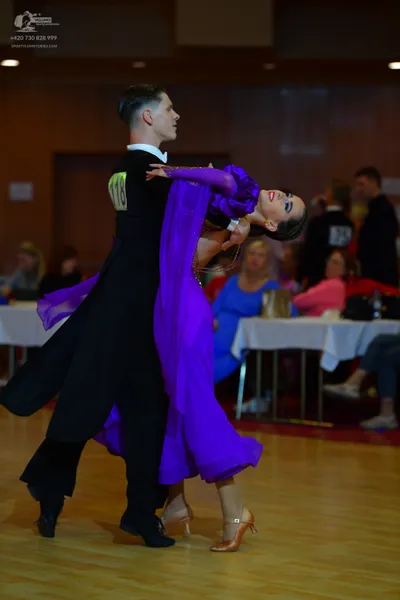 Dancesport competitor #118: Male dancer: black ballroom suit