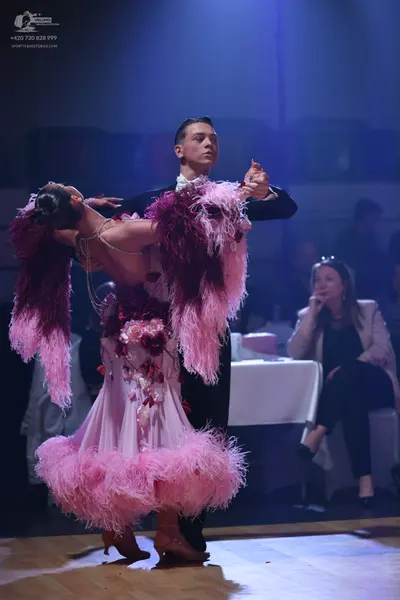 Dancesport competitor: Male dancer: black suit