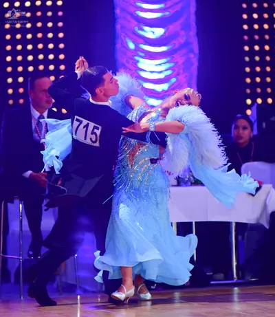 Dancesport competitor #715: Male dancer: black suit