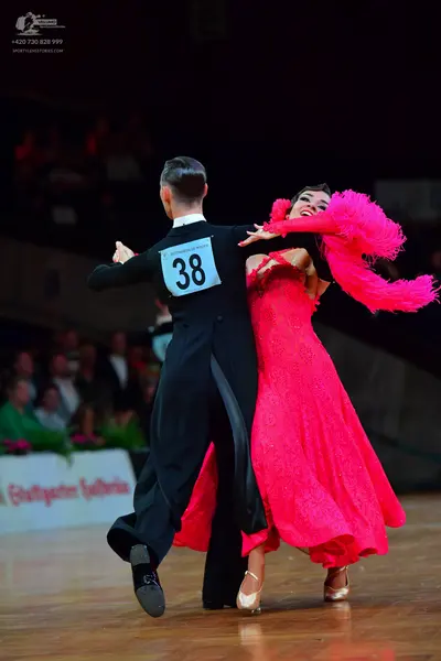 Dancesport competitor #38: Male dancer: black ballroom tailcoat with a white shirt and black bow tie