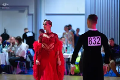 Dancesport competitor #832, #237: Male dancer: black long-sleeved shirt