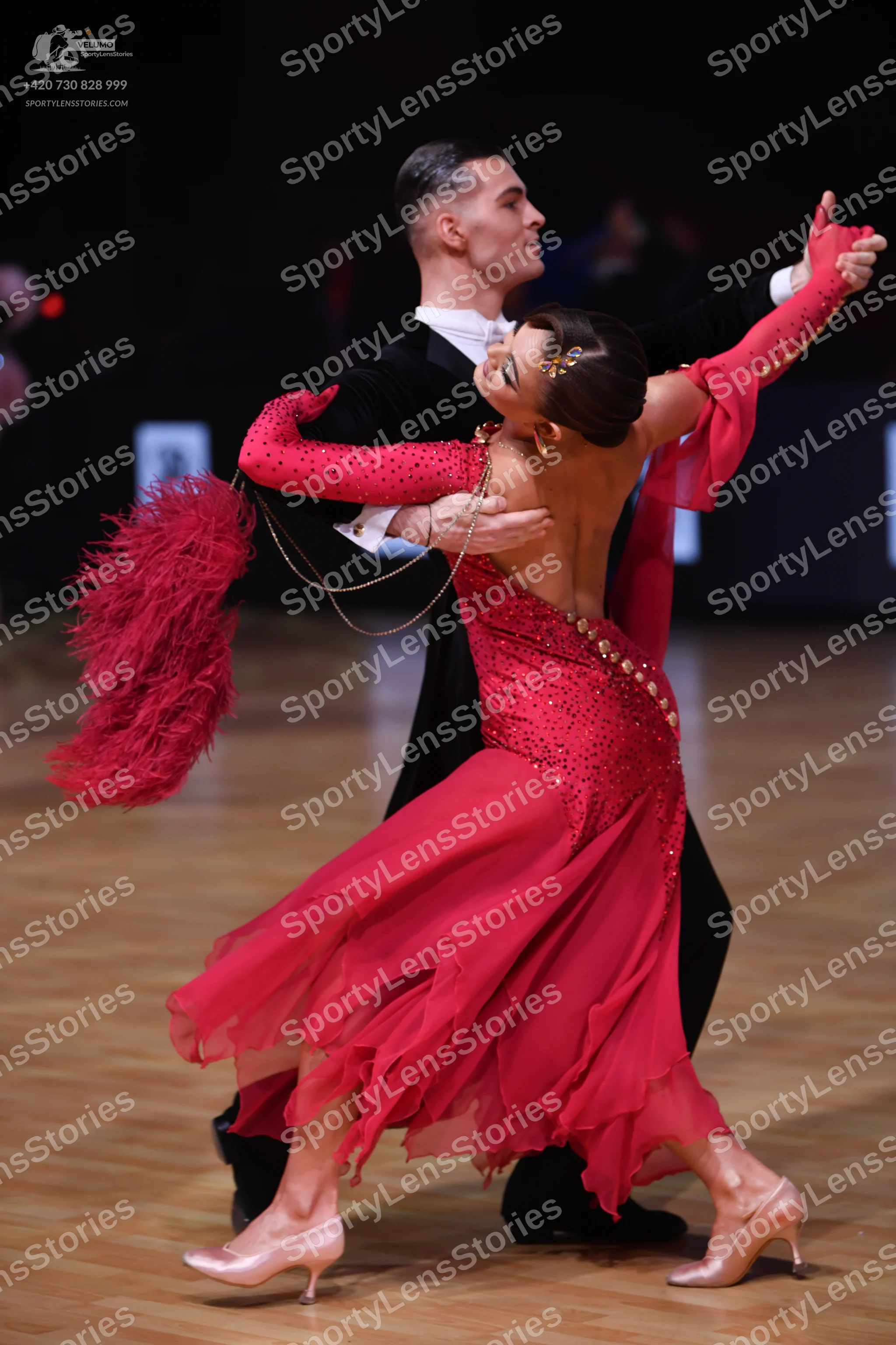 Dancesport competitor: Male dancer: black suit with a white shirt