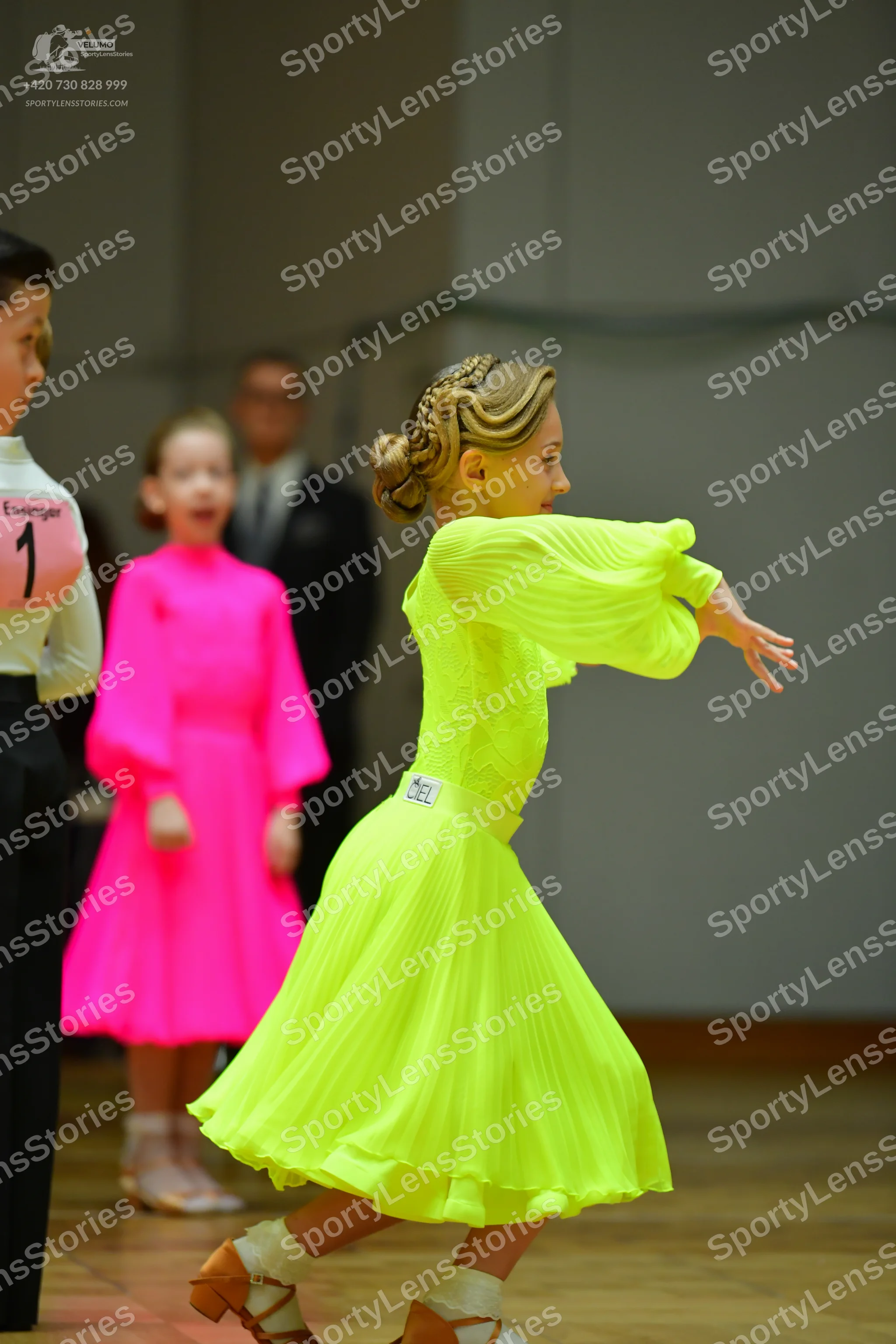 Dancesport competitor: Male dancer: white shirt and black trousers
