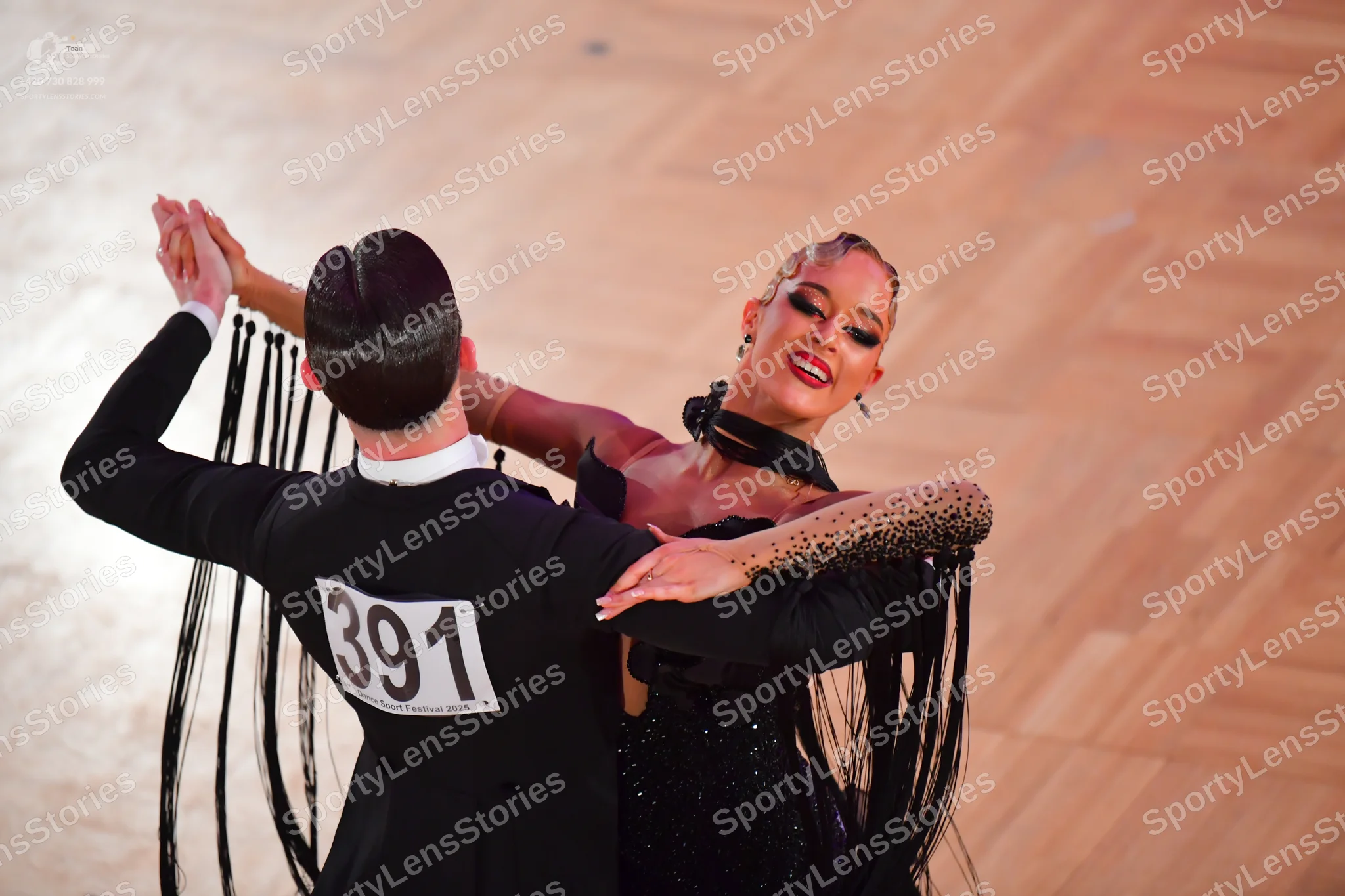 Dancesport competitor #391: Male dancer: black suit