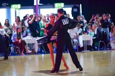 Dancesport competitor #176: Male dancer: black suit