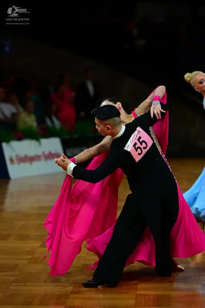 Dancesport competitor #55: Male dancer: black long-sleeved top and black trousers