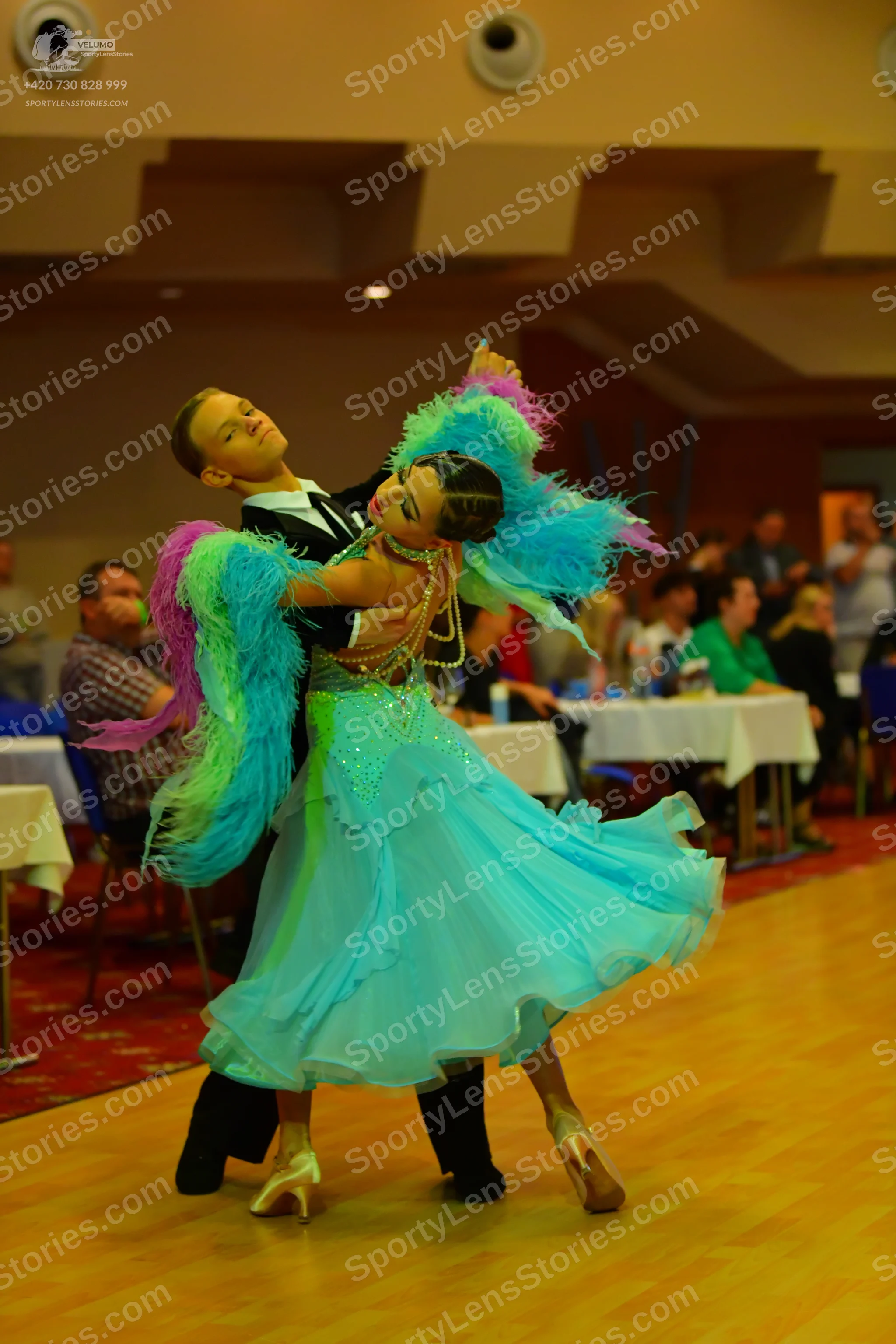 Dancesport competitor: Male dancer: black suit with a white shirt and black bowtie