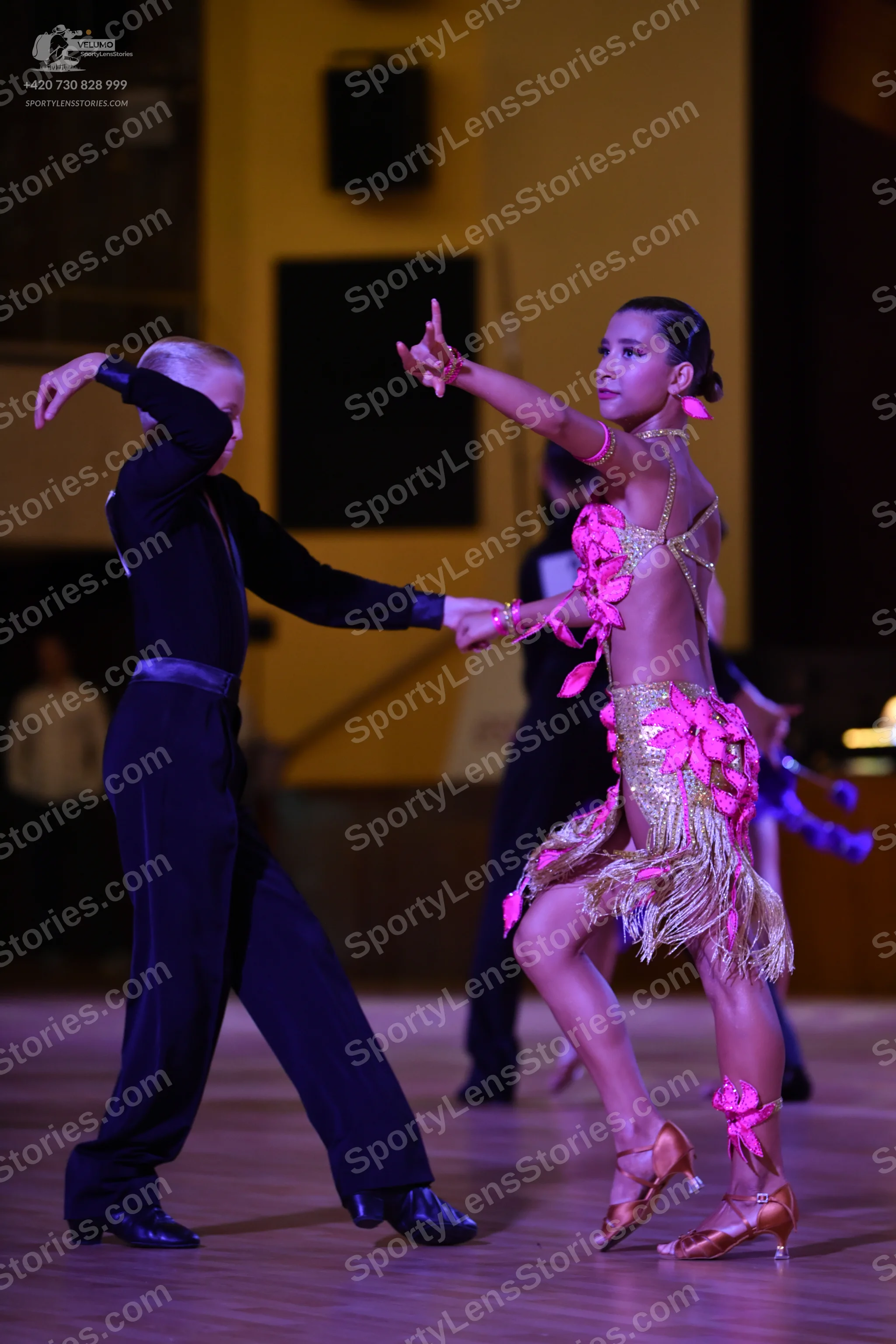 Dancesport competitor: ** Black tail suit