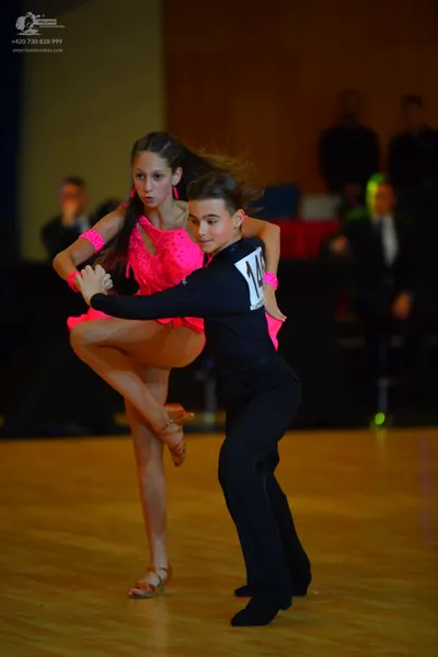 Dancesport competitor #14: Male dancer: black long-sleeved shirt and black trousers