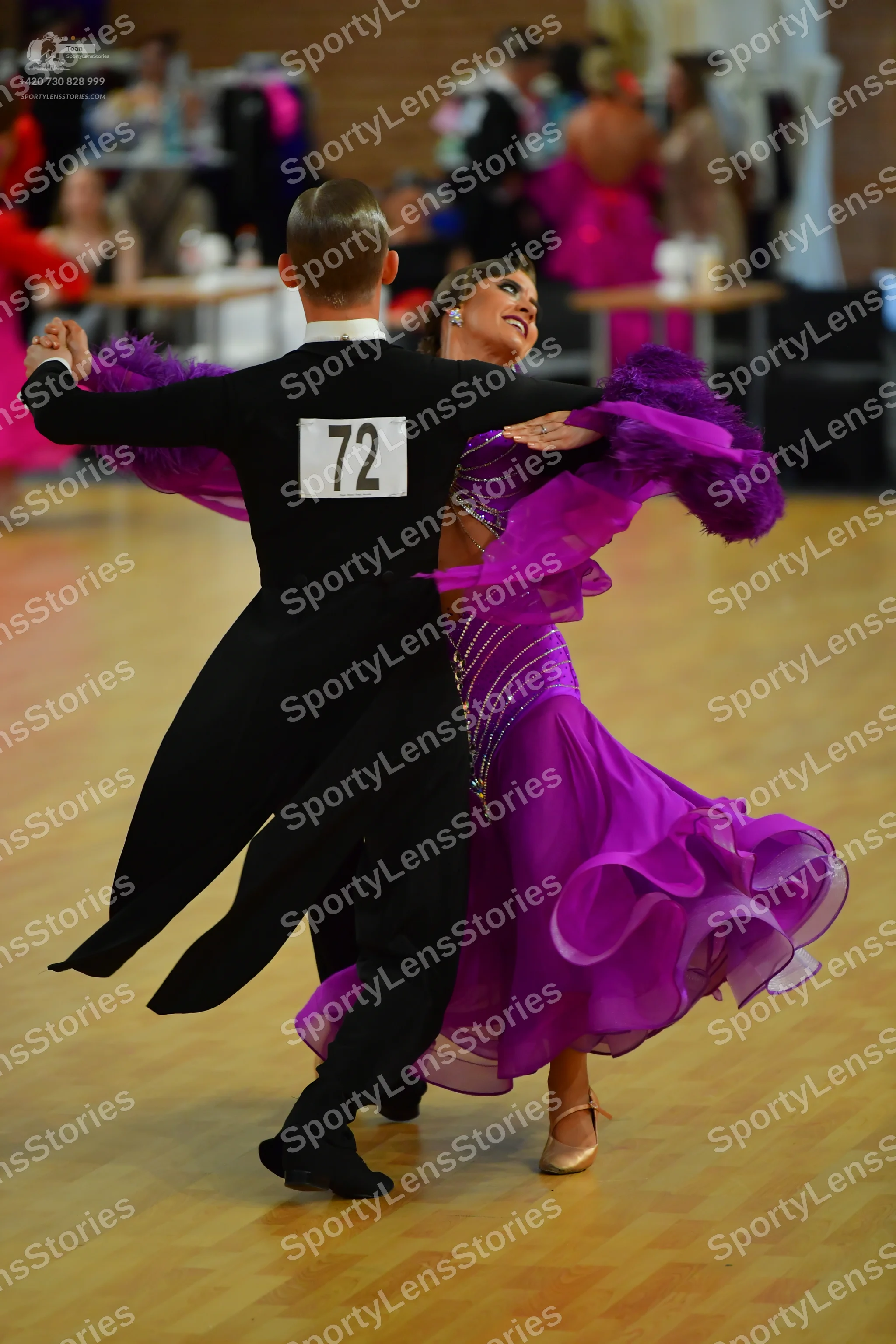 Dancesport competitor #72: Male:**  Black suit with a sequin lapel