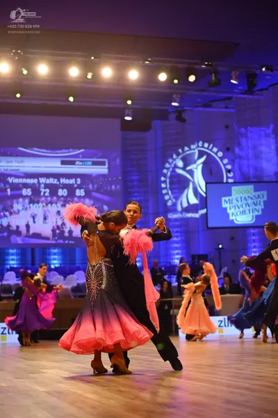 Dancesport competitor: Male dancer: black suit