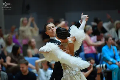 Dancesport competitor: Male dancer: black suit