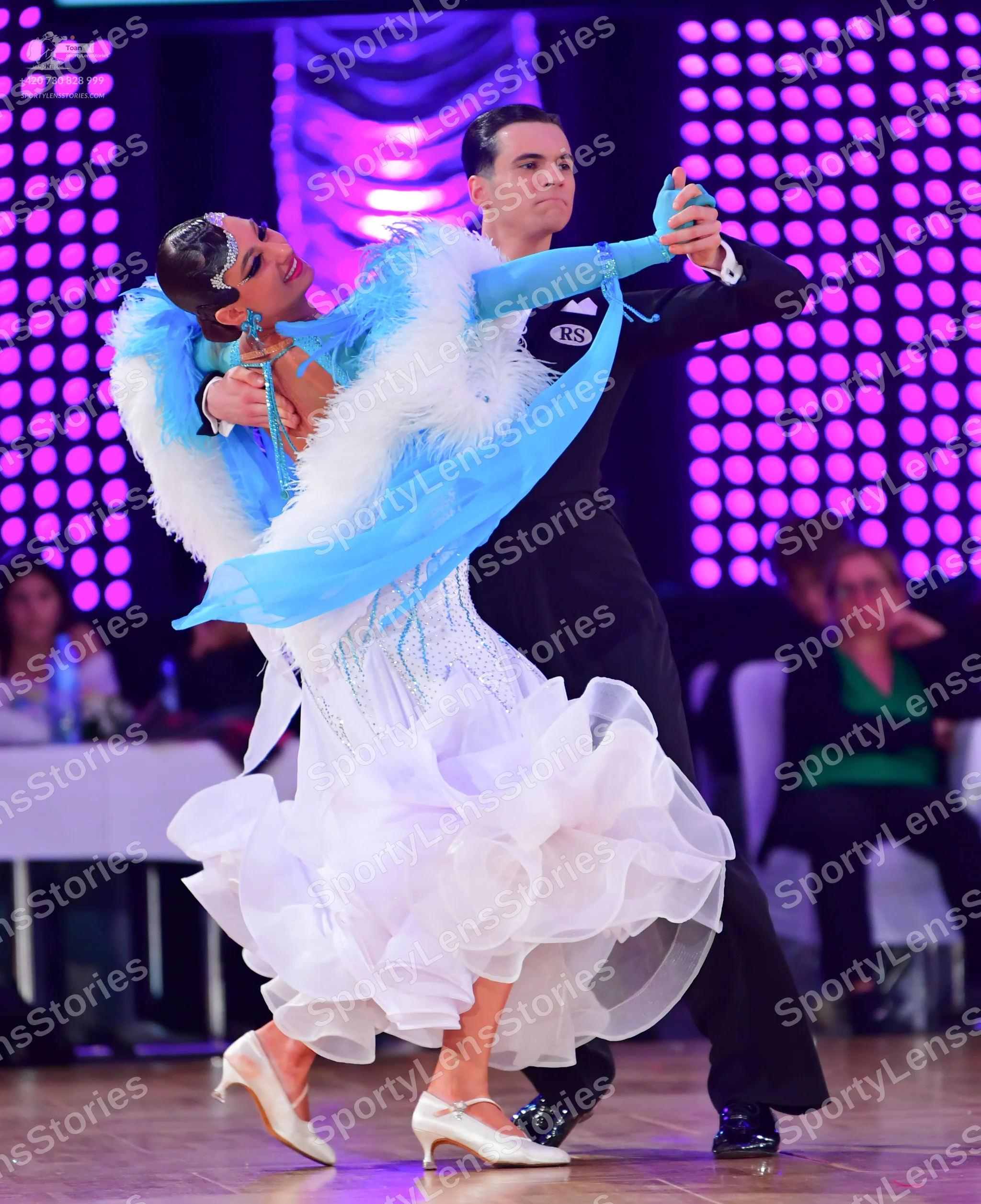 Dancesport competitor: Male dancer: black suit