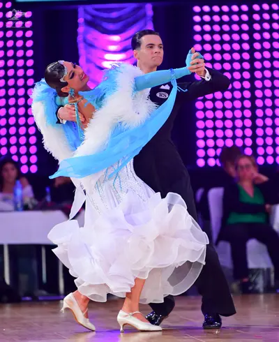 Dancesport competitor: Male dancer: black suit