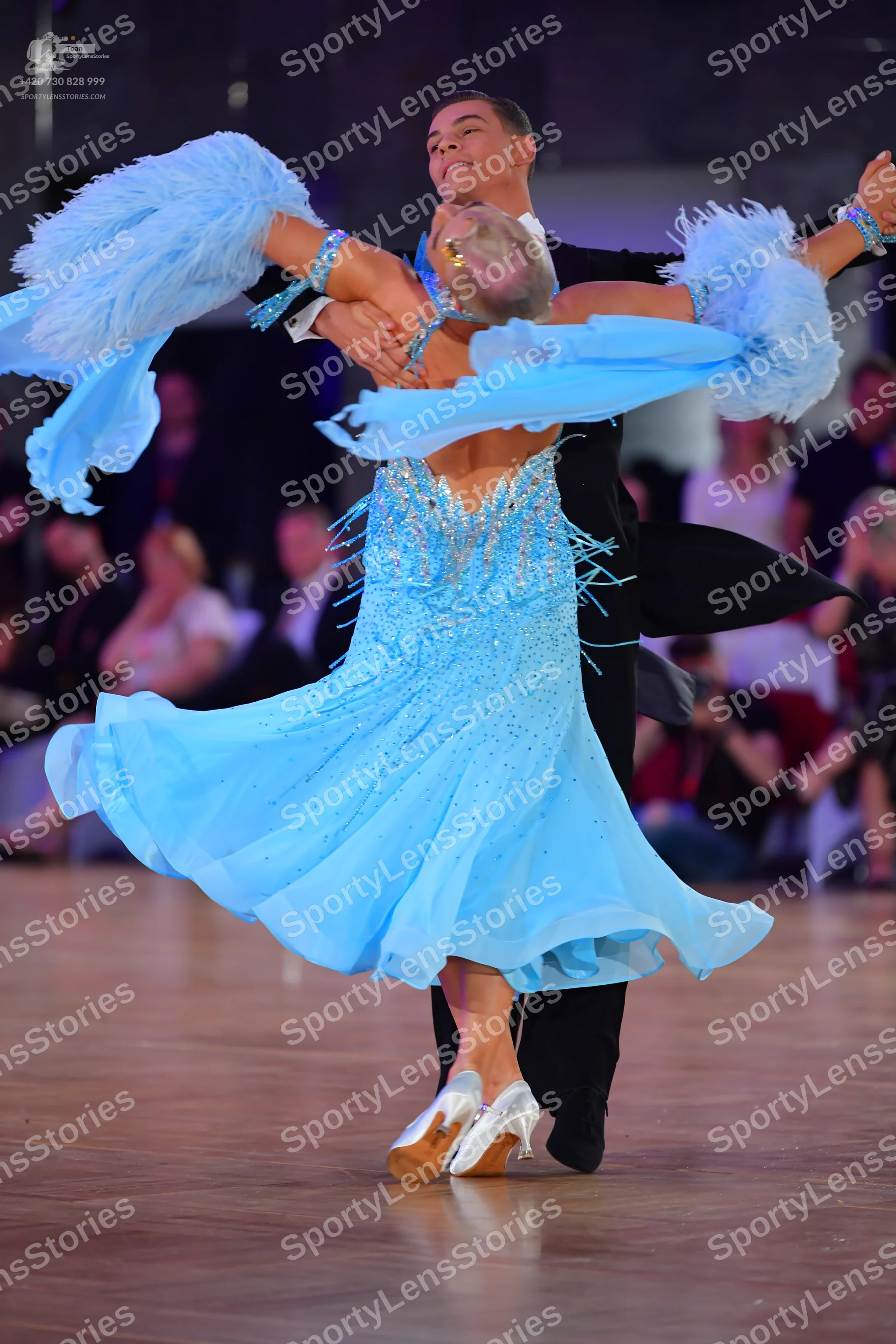 Dancesport competitor: Male dancer: black formal suit