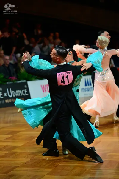 Dancesport competitor #41: Male dancer: black ballroom tailcoat