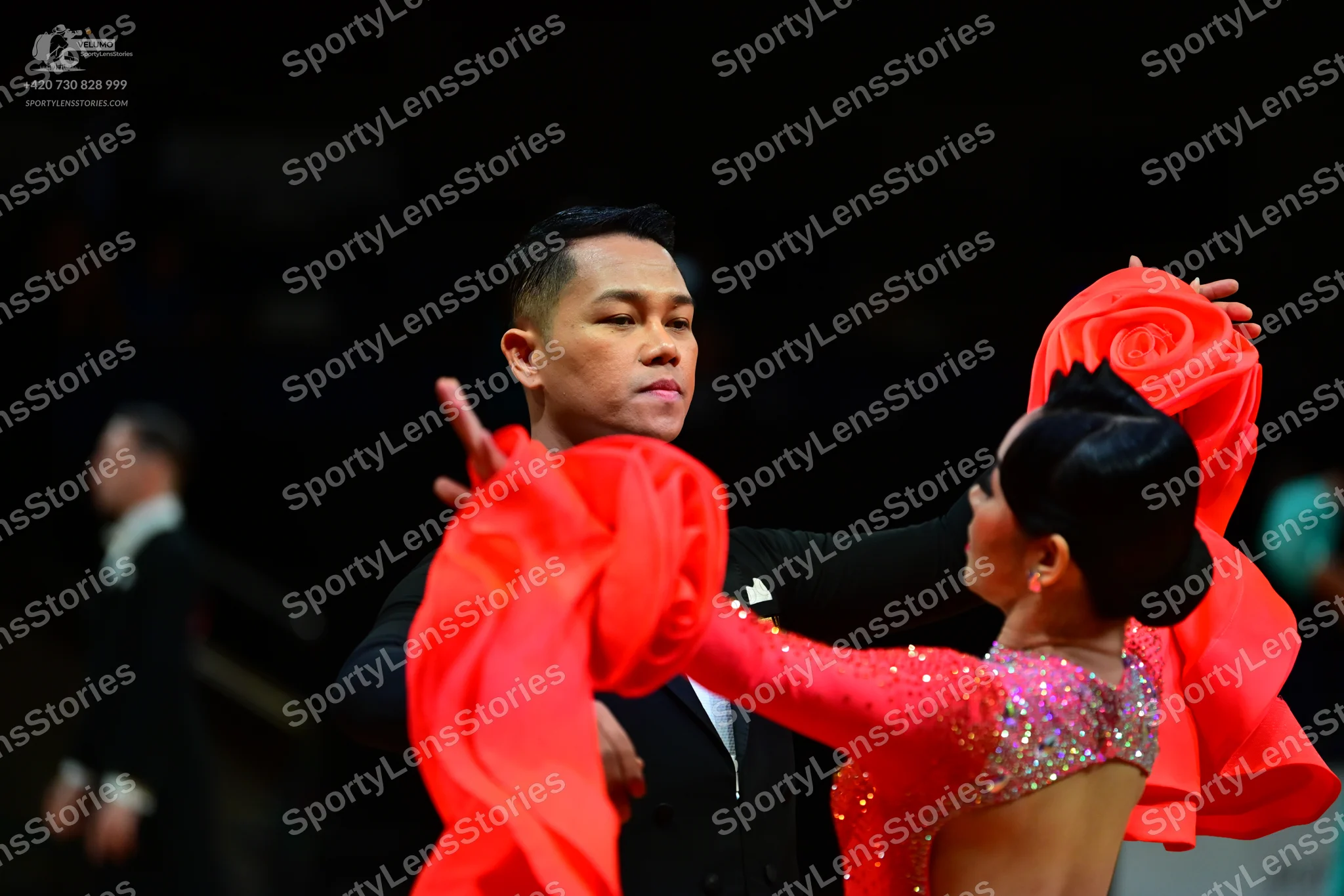 Dancesport competitor: Male dancer: black suit