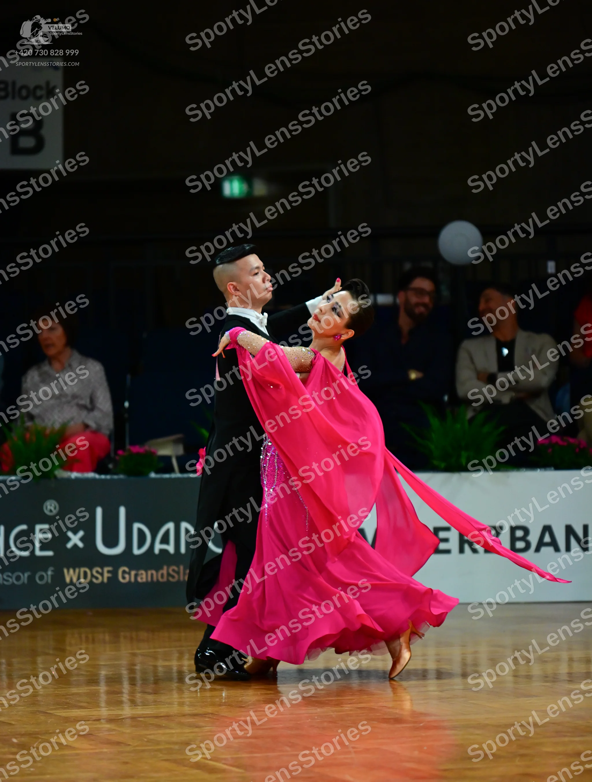 Dancesport competitor: Male dancer: black suit