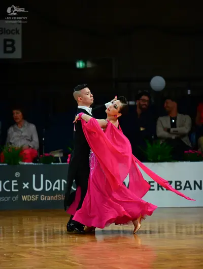Dancesport competitor: Male dancer: black suit