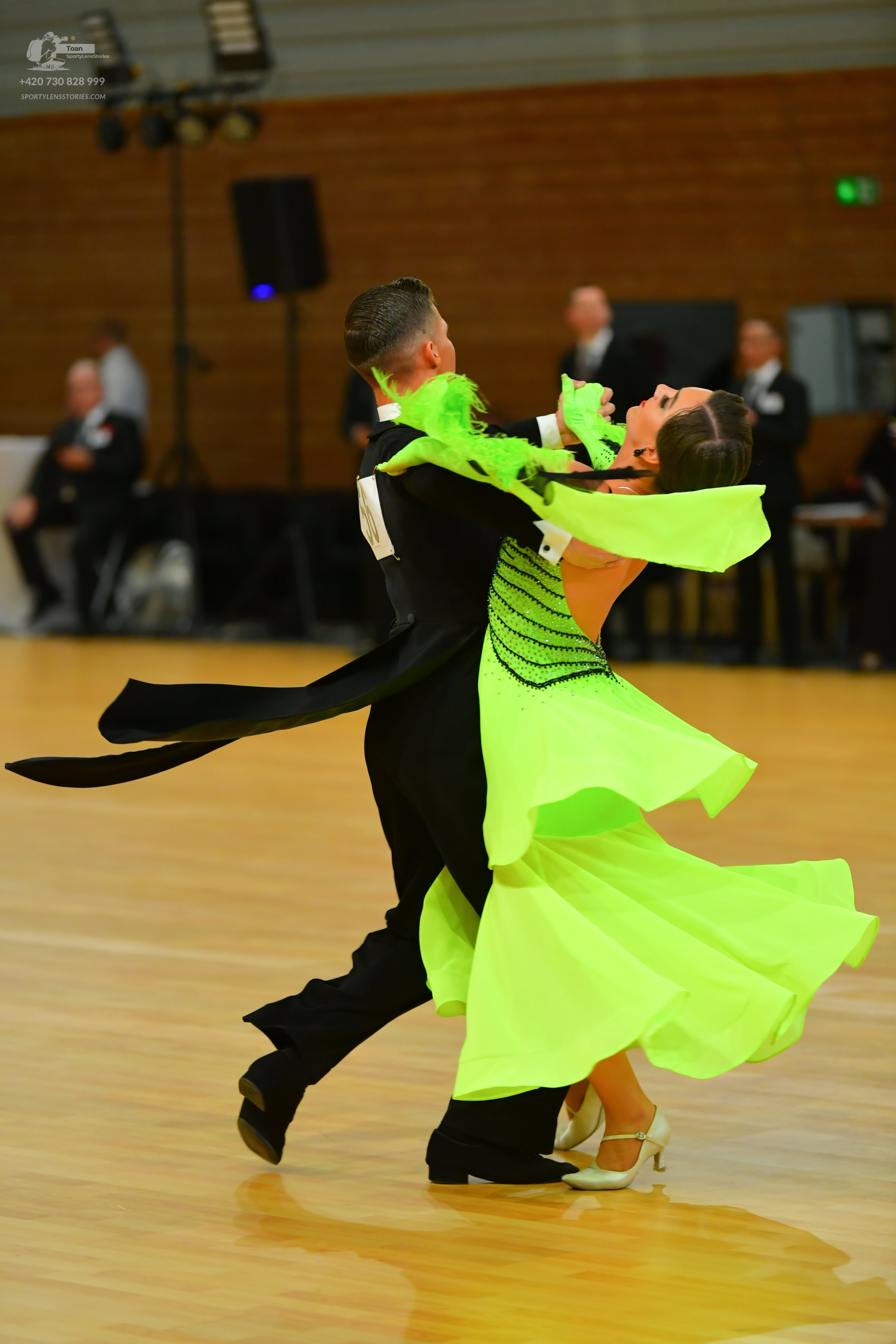 Dancesport competitor: ** Black tailsuit with a wide, dramatic, sequined tail