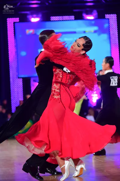 Dancesport competitor #76: Male dancer: black ballroom suit