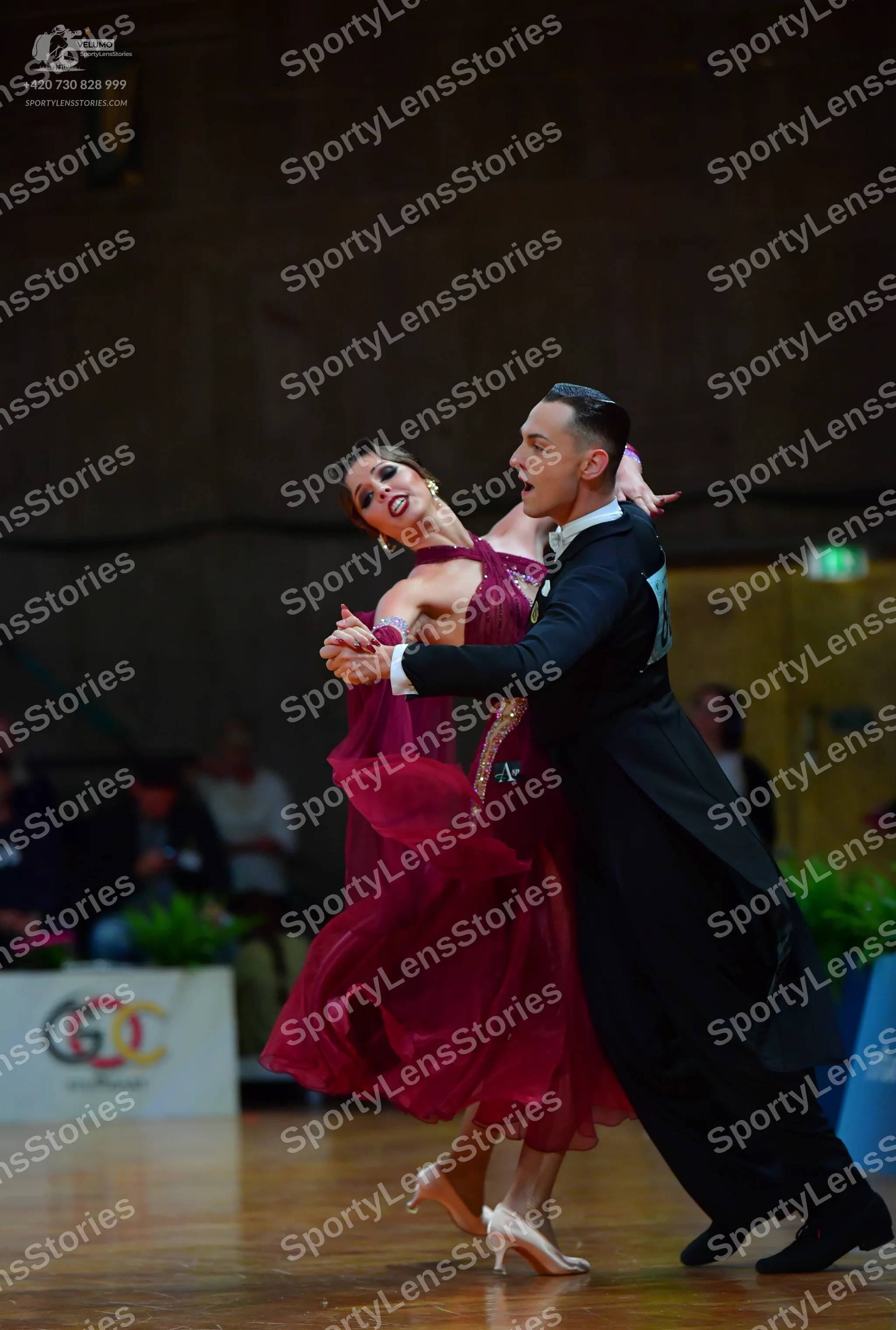 Dancesport competitor: Male dancer: black formal tailcoat, black trousers, and black dance shoes