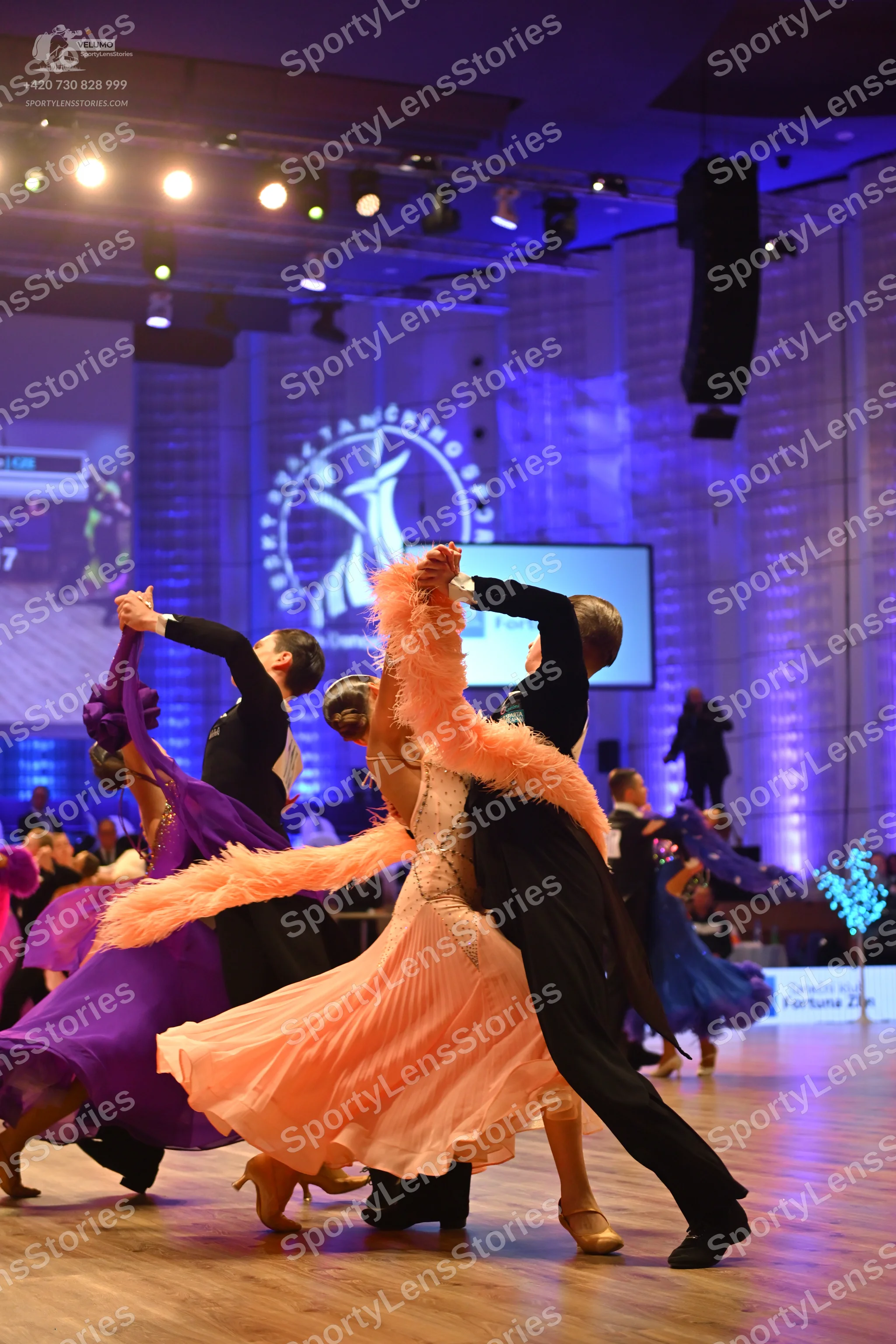 Dancesport competitor: Male dancer (right): black suit