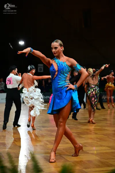 Dancesport competitor #79: Male dancer: white shirt with black trousers