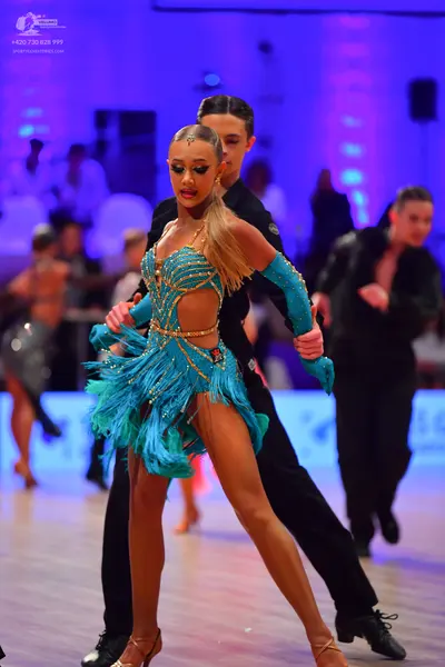 Dancesport competitor: Male dancer: black latin attire