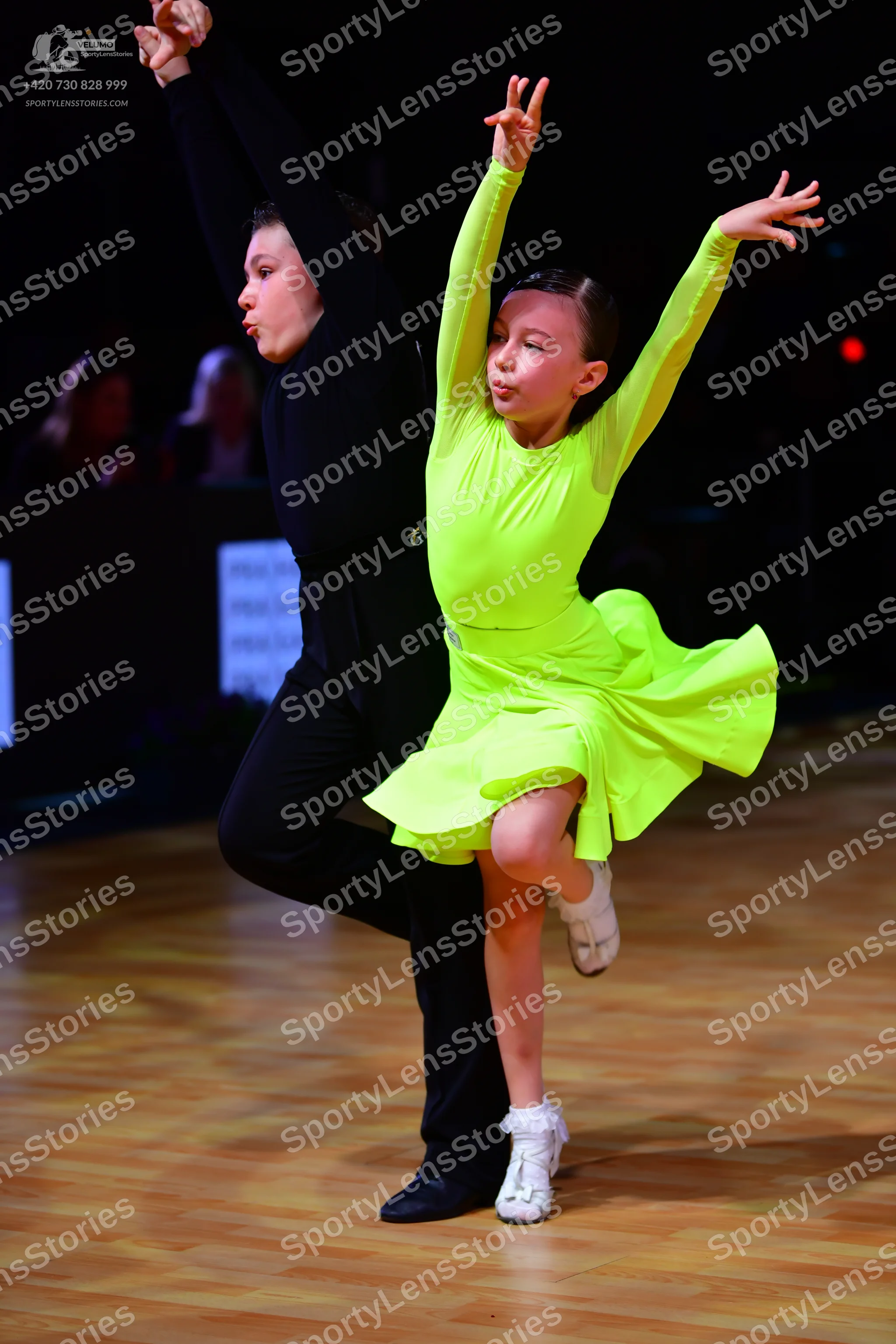 Dancesport competitor: Male dancer: black long-sleeved top and black trousers
