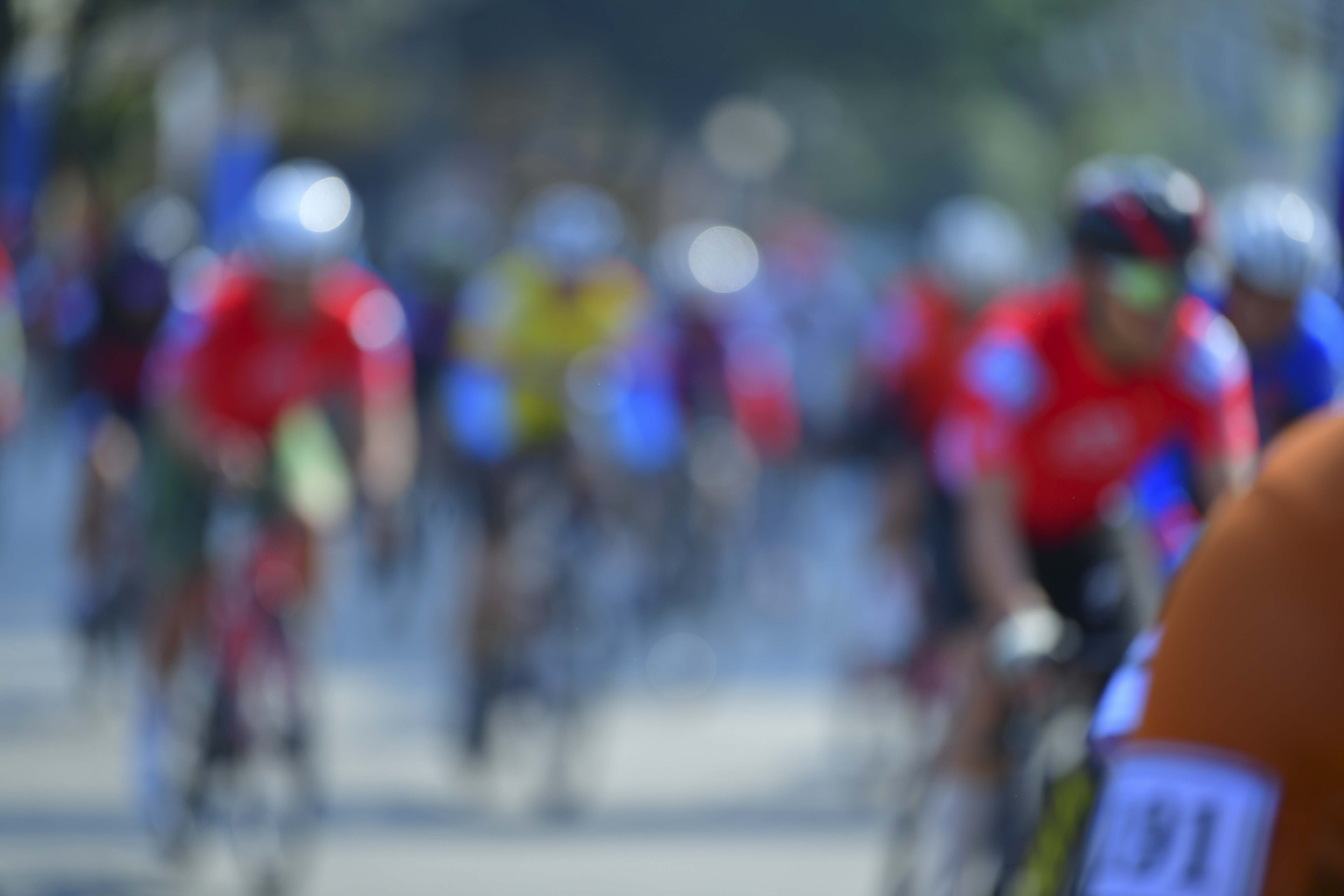 Cyclist: Cyclist 1: red jersey, white shorts