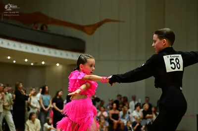 Dancesport competitor #58: Male dancer: black long-sleeved shirt