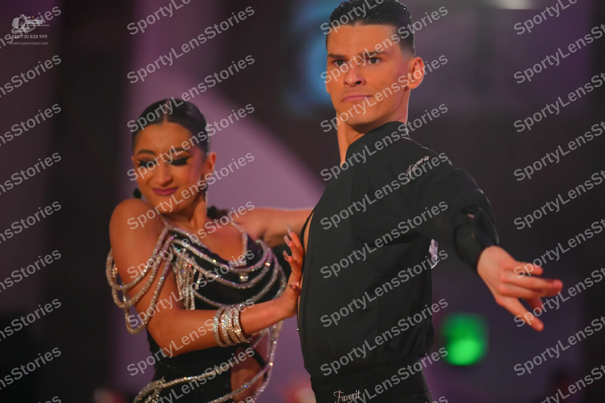 Dancesport competitor: Male dancer: black long-sleeved shirt
