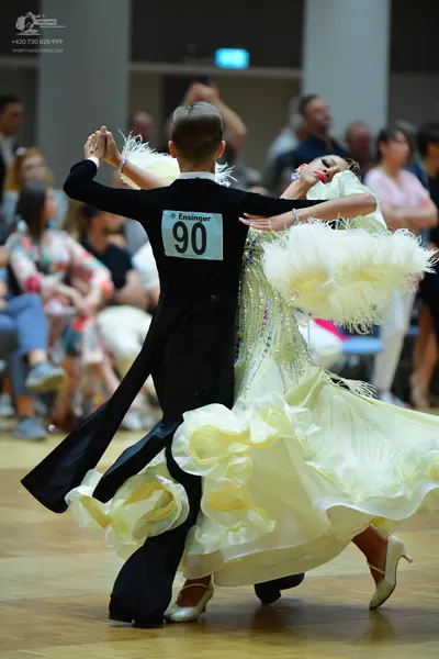 Dancesport competitor #90: Male dancer: black ballroom suit