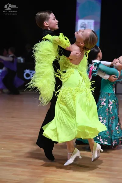 Dancesport competitor: Male dancer: black suit