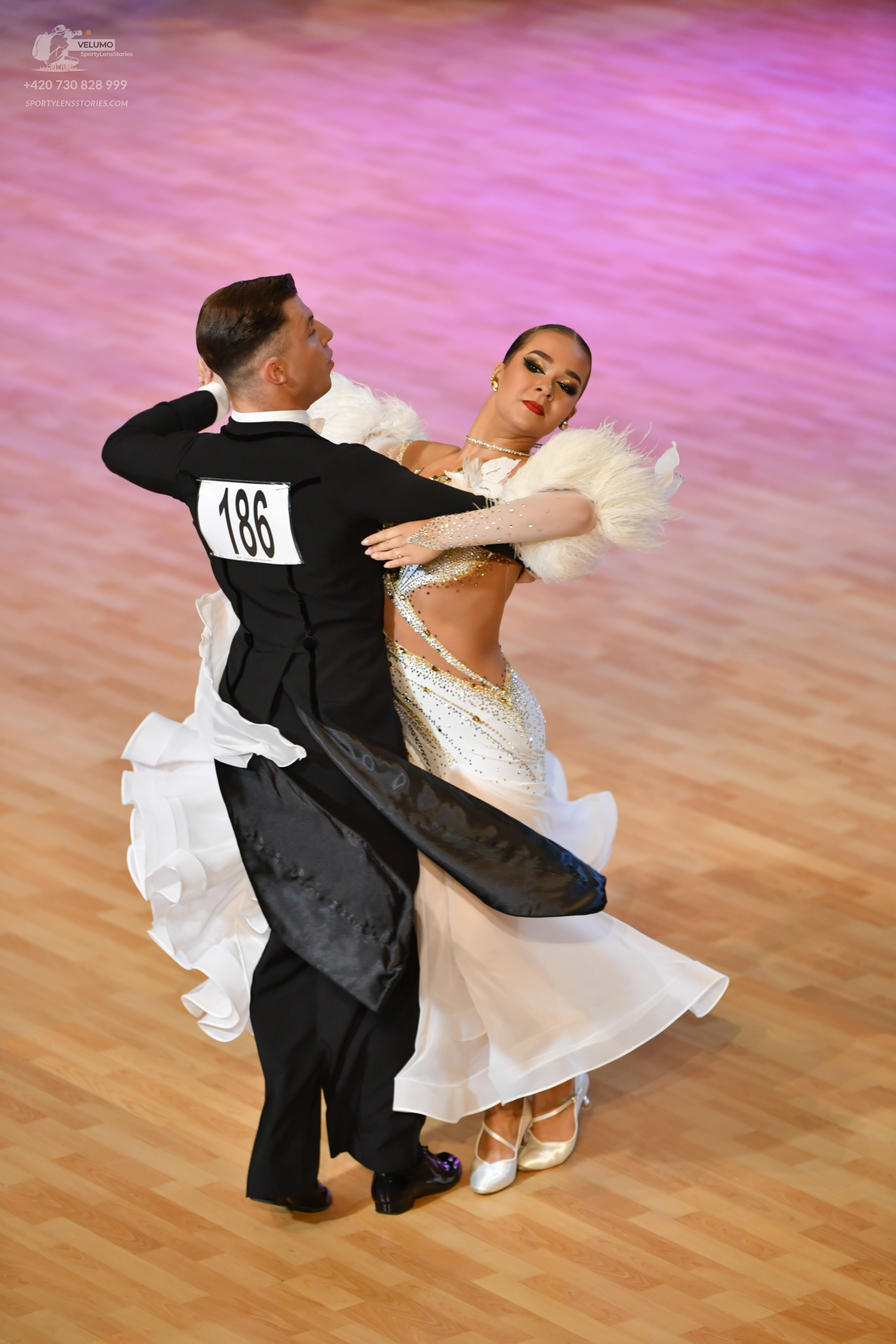 Dancesport competitor: ** Black tail suit