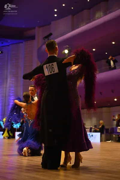 Dancesport competitor: Male dancer: black formal suit